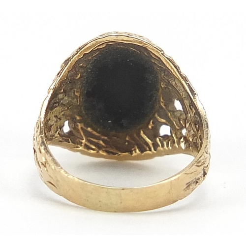 5 - 9ct gold black onyx signet ring with pierced shoulders, size H, 2.5g