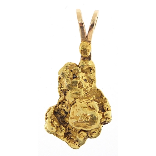 32 - Heavy gold nugget pendant, the suspension loop marked 14k CASEY, 4cm high, 22.7g