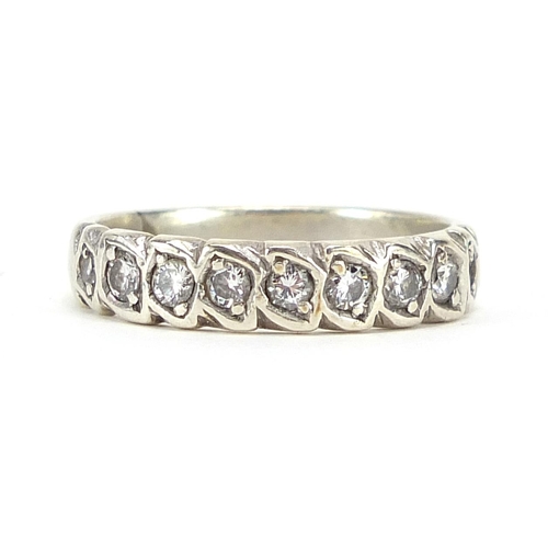 18 - Unmarked white metal diamond half eternity ring, size N, 3.9g