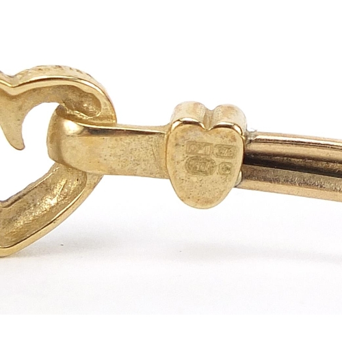 48 - 9ct gold love heart bangle, 5.9cm wide, 4.7g