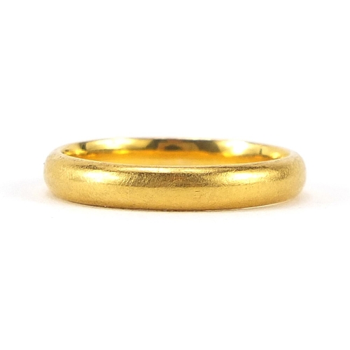 40 - Unmarked gold wedding band (tests as 22ct gold), size N, 4.7g - this lot is sold without buyer’s pre... 