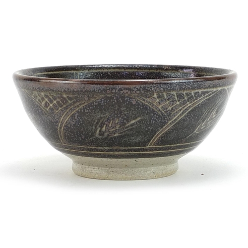 22 - Chris Lewis for South Heighton, studio pottery bowl decorated with stylised flowers, 14cm in diamete... 
