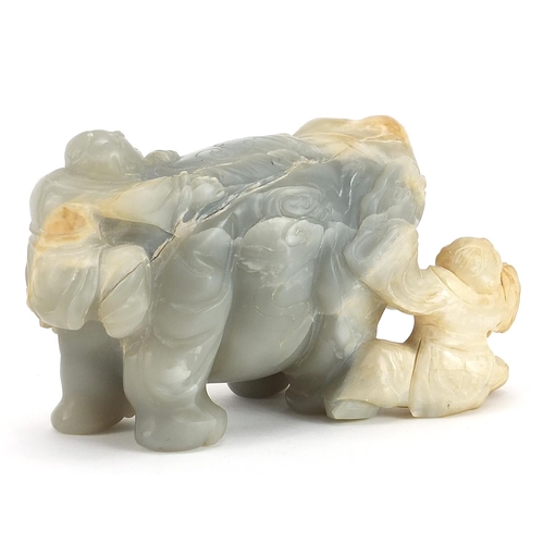 14 - Chinese pale green and russet hardstone carving of two boys and an elephant, possibly jade, 15cm in ... 