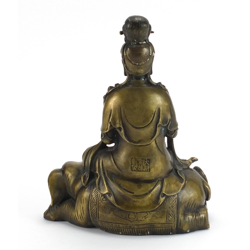 34 - Chinese patinated bronze study of Guanyin seated on an elephant, 29.5cm high