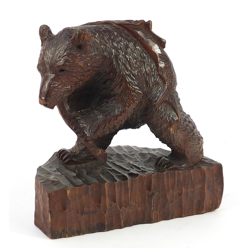 51 - Large Black Forest carving of a bear with fish, 31cm wide