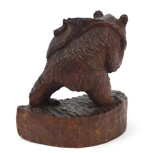 51 - Large Black Forest carving of a bear with fish, 31cm wide