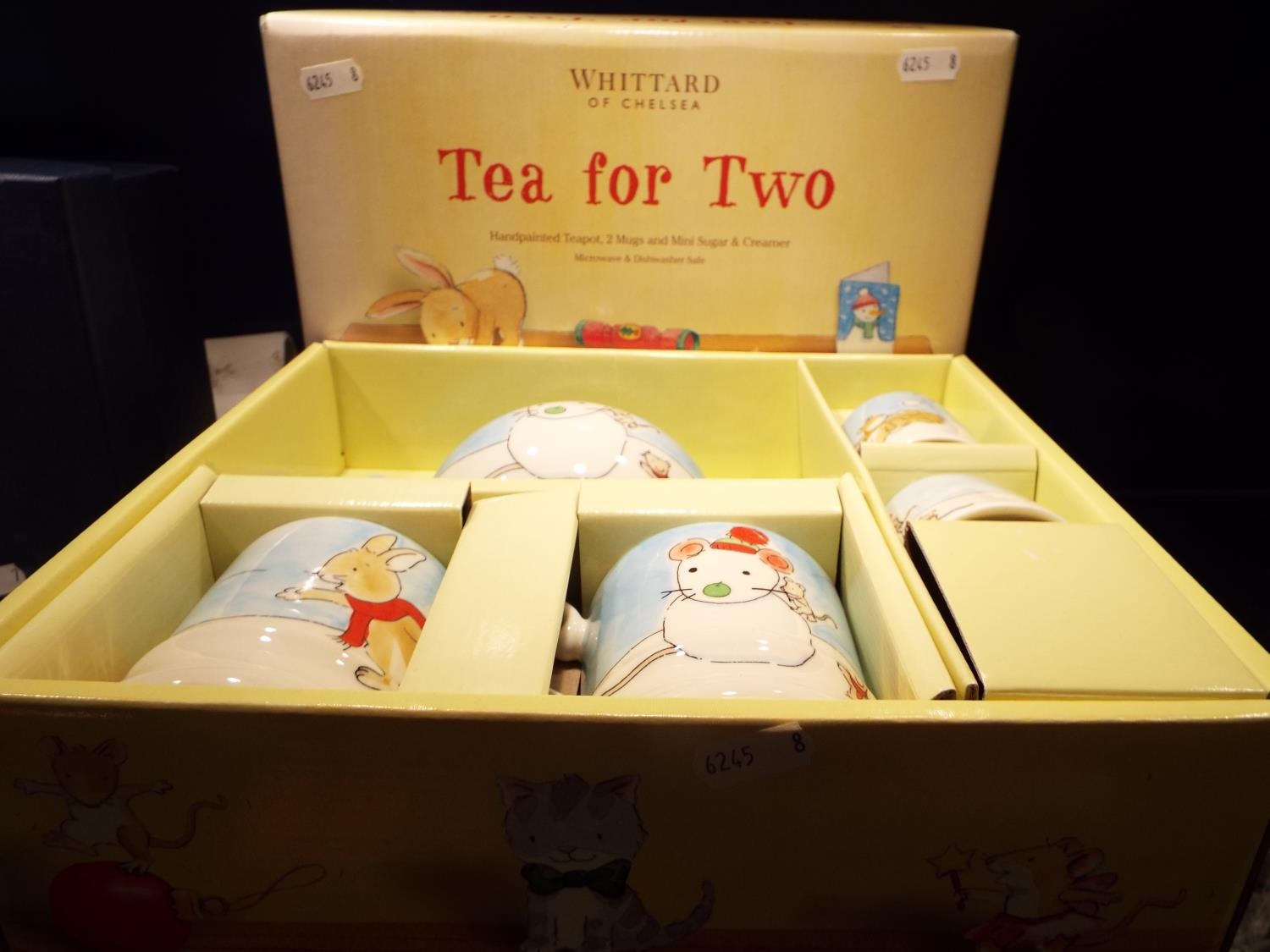 A boxed Whittard of Chelsea tea for two with hand painted decoration