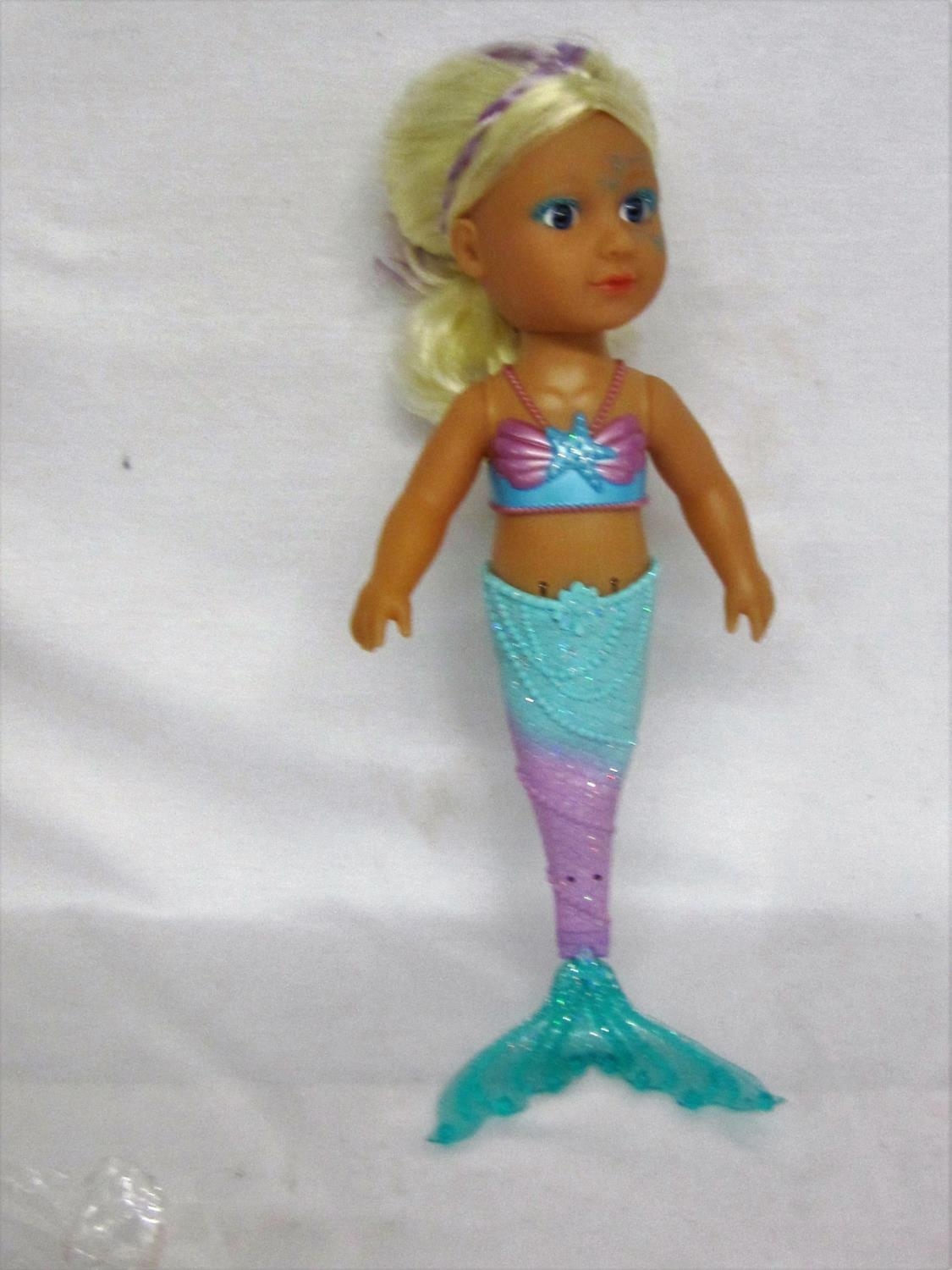 little sister mermaid doll