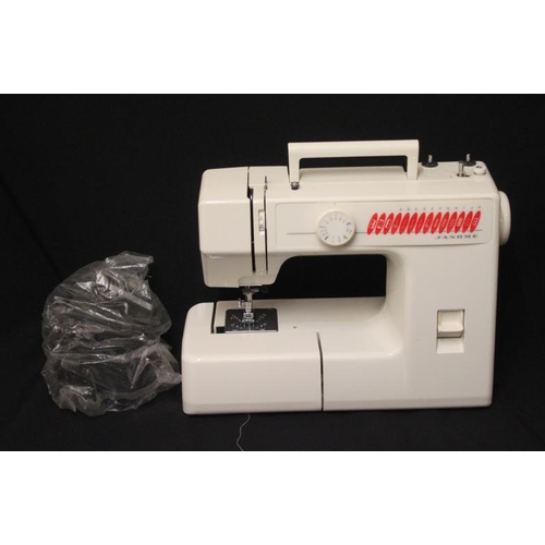Janome Model JS 1004 Sewing Machine Boxed with attachments Barnebys