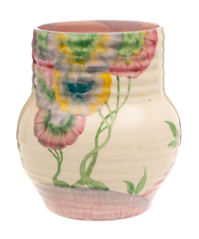 A Clarice Cliff pottery vase of ribbed globular form with raised neck
