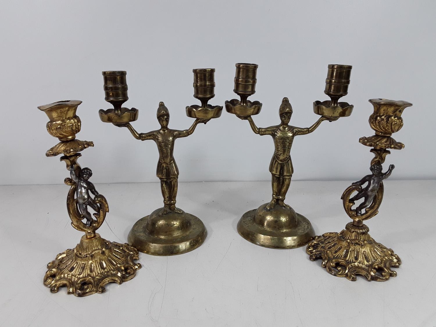 2 pairs of brass candle sticks