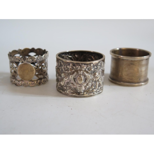 20 - A Victorian Silver Napkin Ring decorated with putti and ribbons in a continuous landscape Birmingham... 