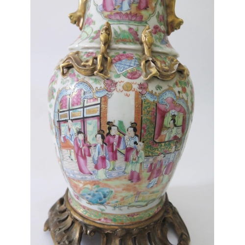 371 - A Nineteenth Century Cantonese Porcelain Famille Rose Vase with rococo ormoulu mounts, drilled to ba... 
