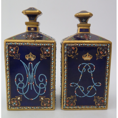 389a - An Eighteenth Century Sevres Porcelain Inkwell with matching pair of canisters bearing the monogram ... 