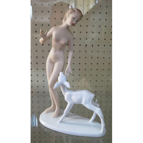 369 - A Württemberg porcelain figurine of a nude with fawn