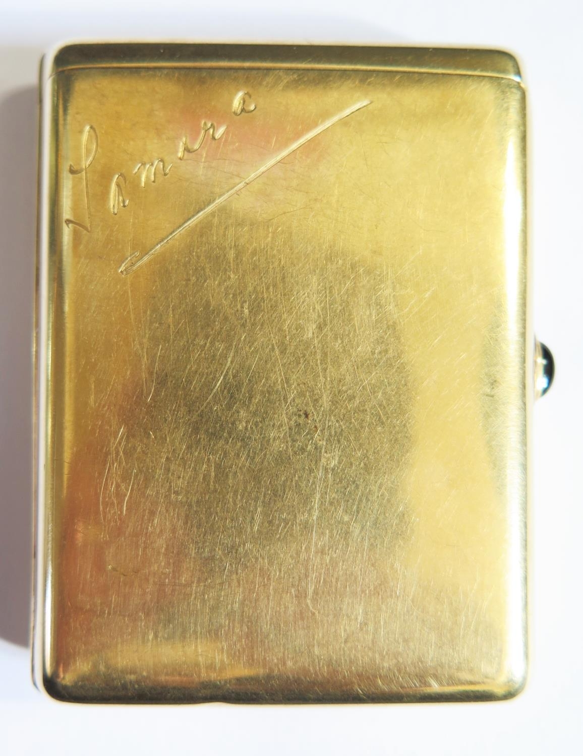 A Cartier 14K Gold Cigarette Case with cabochon button, stamped marks ...