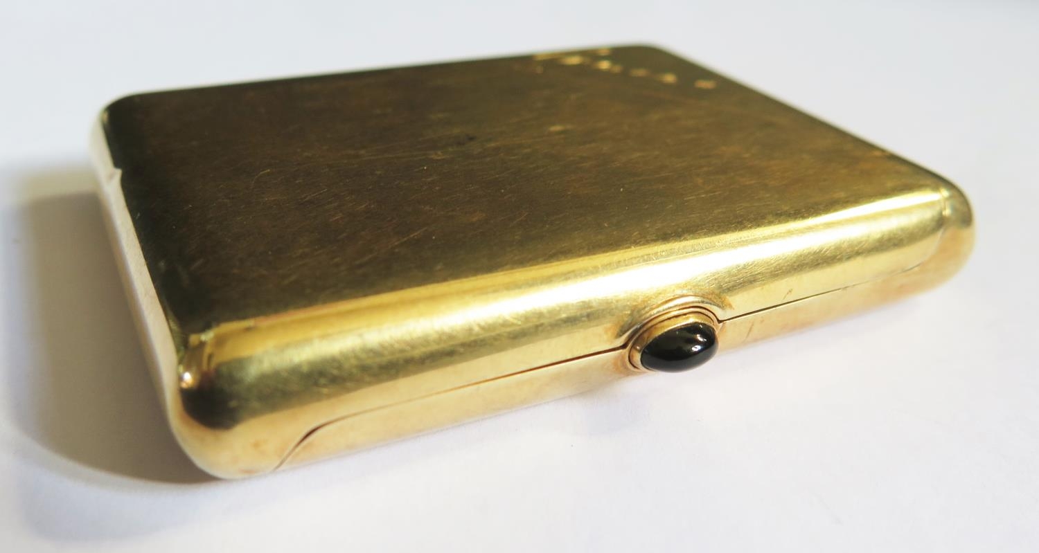 A Cartier 14K Gold Cigarette Case with cabochon button, stamped marks ...