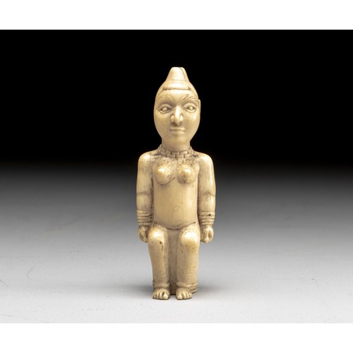 AN IVORY FIGURE, POSSIBLY YOMBE, DEMOCRATIC REPUBLIC OF THE CONGO, EARLY 20TH CENTURY