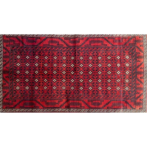 52 - A BALOUCH RUG, IRAN267 by 143cm