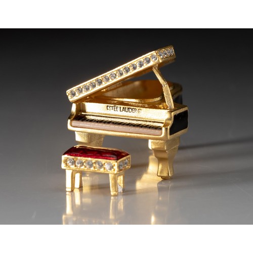 42 - AN ESTEE LAUDER SOLID PERFUME COMPACT, BABY GRAND, 2000