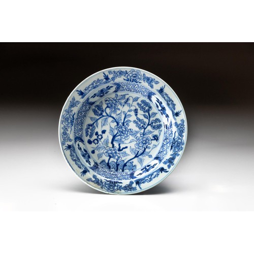 822 - A CHINESE BLUE AND WHITE 'MANDARIN DUCK AND PEONY' PLATE, QING DYNASTY, QIANLONG