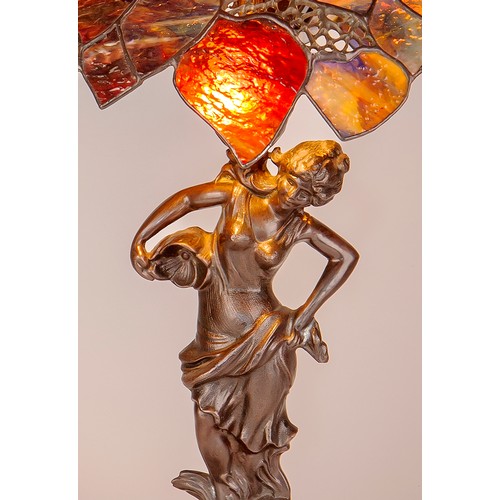 512 - A LEAD-GLASS FIGURAL TABLE LAMP, 20TH CENTURY