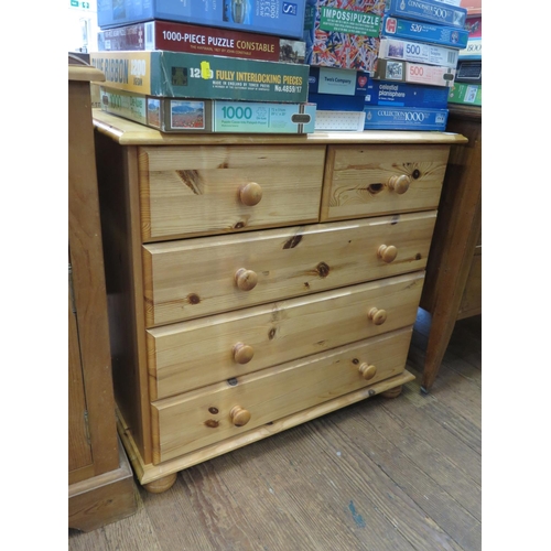 A Pine Chest Of Drawers With Two Short And Three Long Drawers On Bun Feet 84 Cm Wide 45 Cm Deep