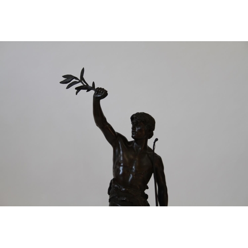 12 - Eugene Marioton. A Good French Bronze Statue of an Archer. Shown holding a loft a laurel leaf. Signe... 