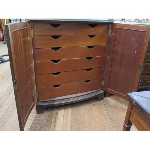 34 - An Unusual Late Victorian Mahogany Press Cupboard. Circa 1890. With a pair of doors opening to revea... 