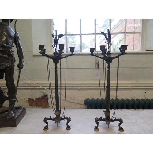 15 - A Pair of Regency Bronze Five light Candelabra. Each cast with a Heron Standing on top of a Turtle. ... 