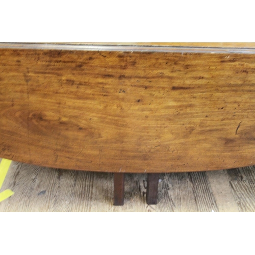 17 - A Rare Irish 18th Century Mahogany Wake Table. With two massive rop leaves. On square legs. 71cm x 2... 