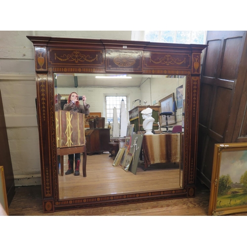 19 - A Sheraton Style Mahogany Over Mantle Mirror. 19th century. With bevelled plate glass. The frame inl... 