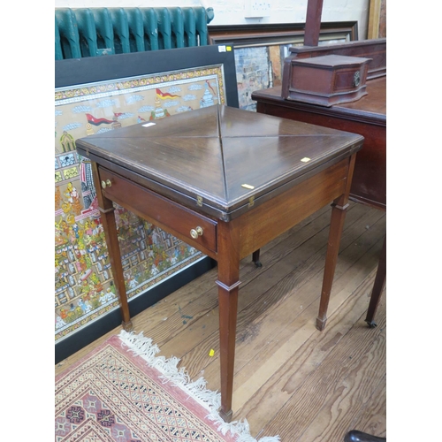 3 - An Early 20th century Mahogany card table. The top with four folding leaves opening to reveal a gree... 