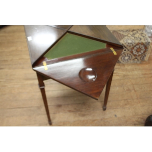 3 - An Early 20th century Mahogany card table. The top with four folding leaves opening to reveal a gree... 