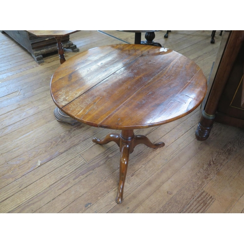 31 - A George III mahogany Tripod Table. late 18th century. With large open rub joint to top. 65cm x 75cm... 