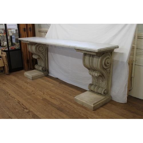 5 - A massive late 18th century Console table. Of architectural proportions. The wooden base carved in h... 