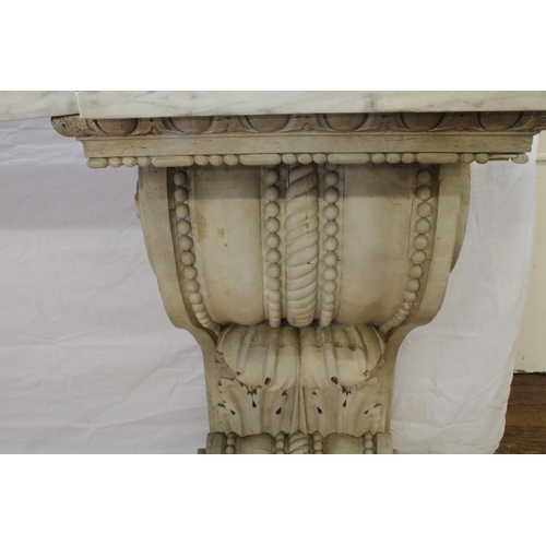 5 - A massive late 18th century Console table. Of architectural proportions. The wooden base carved in h... 