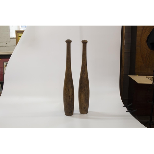 57 - A Pair of 18th century Mahogany Pilasters. With fluted decoration. And a pair of Indian Exercise Clu... 