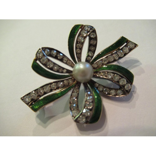 813 - Edwardian gold enamel decorated ribbon brooch set with a single natural pearl and old cut diamonds
