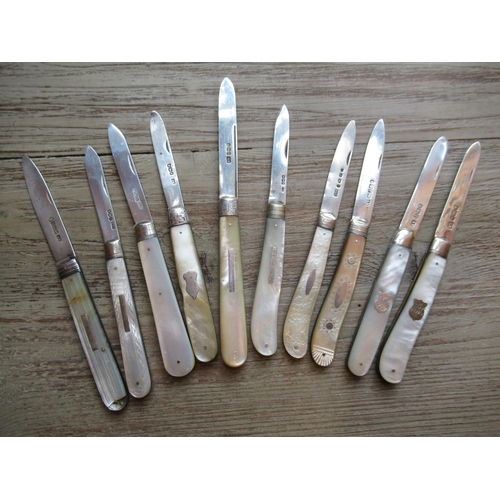 828 - Collection of ten 19th and 20th Century silver bladed and mother of pearl handled fruit knives