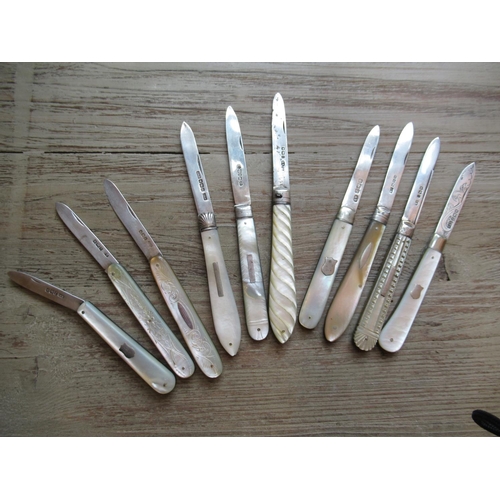 831 - Collection of ten 19th and 20th Century silver bladed and mother of pearl handled folding fruit kniv... 