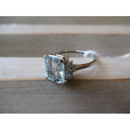 858 - Art Deco style platinum ring set central aquamarine and diamond set shoulders, 0.12 / 2.15cts