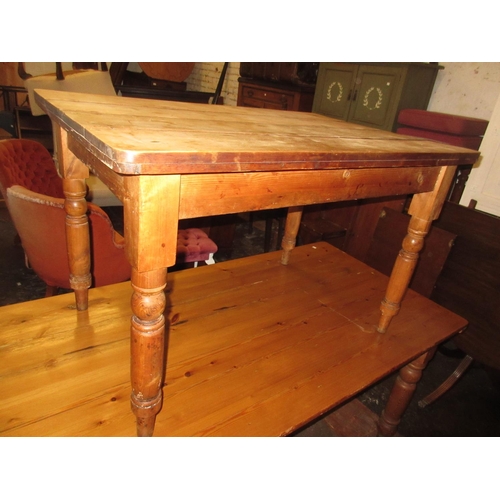 1333 - Victorian stripped pine kitchen table on turned supports, 31ins x 46ins together with a set of four ... 
