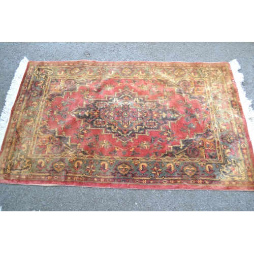 34 - Indian rug with a medallion design on an ivory ground, 6ft x 4ft approximately, together with a smal... 