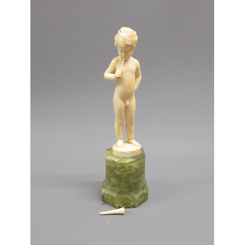 85A - Ferdinand Preiss, small Art Deco carved ivory figure of a nude boy playing a horn mounted on an onyx... 