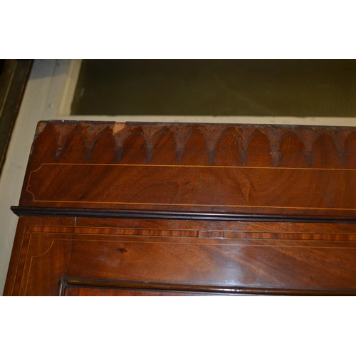 1348 - 19th Century mahogany and satinwood inlaid linen press with two panelled doors enclosing linen slide... 