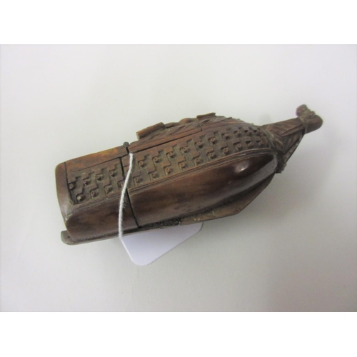 108 - 18th Century carved coquilla nut snuff box in the form of a man o' war, 4.5ins wide