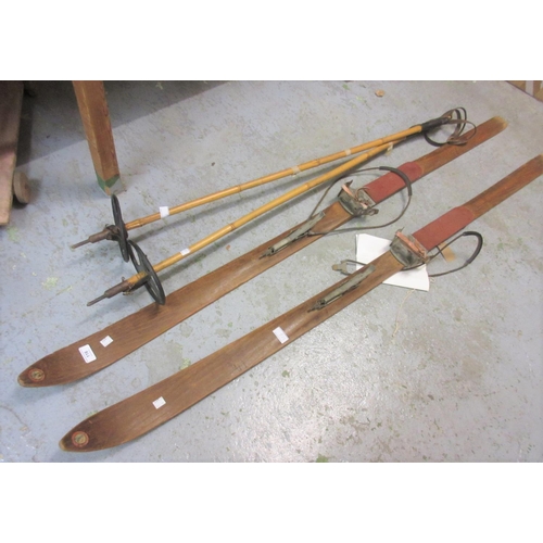 116 - Pair of early to mid 20th Century wooden skis with bamboo poles marked Spezial Riesengebirgs