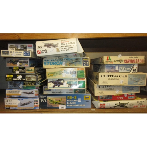 140 - Approximately twenty various boxed Aircraft model construction kits including: Hasegawa, Heller and ... 