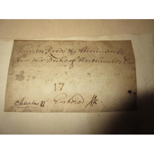 83 - The upper portion of a document signed Charles R. (Charles II), ordering garter robes for the Duke o... 